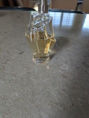 Donna Karan Women’s Serum Bottle in Clear Glass with Pale Golden Liquid